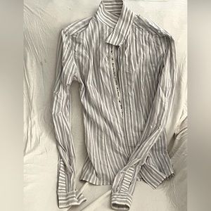 Fits size small equestrian show shirt